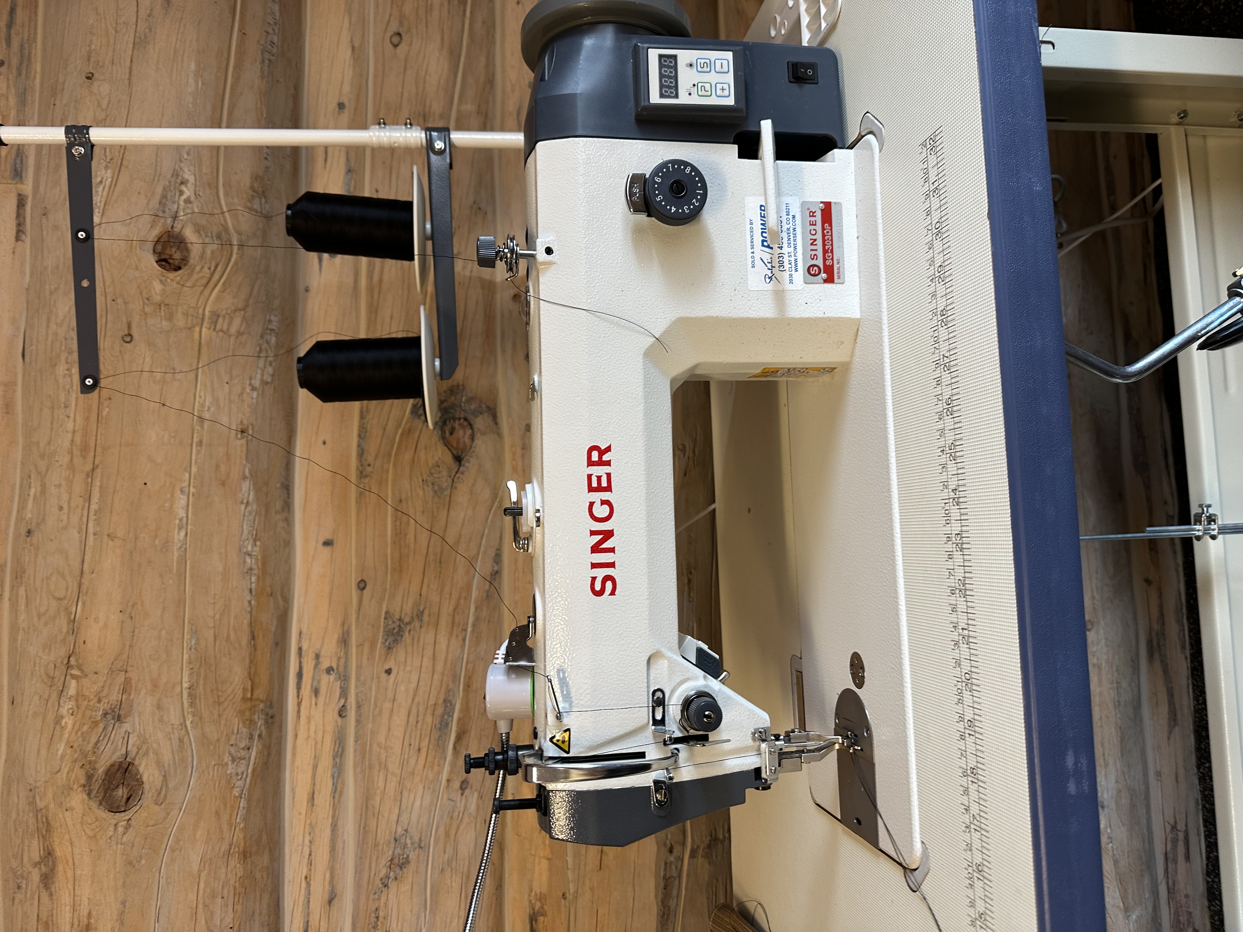 An image of an industrial sewing machine.