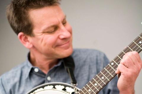 image of Jim Gill playing the banjo