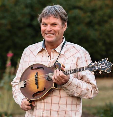 image of Thomas Sneed with his mandolin