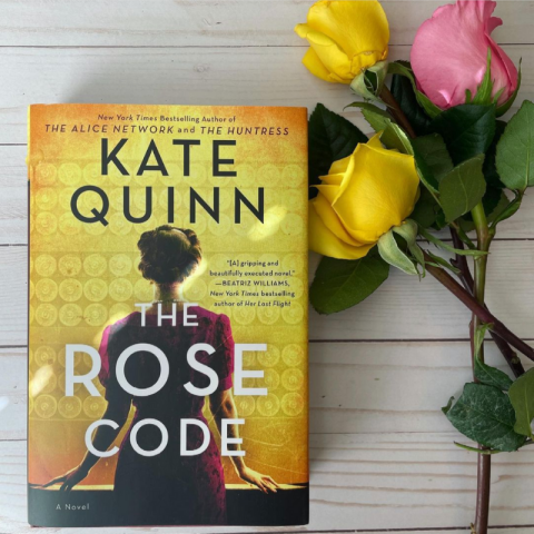 image of the book cover for The Rose Code next to 3 roses